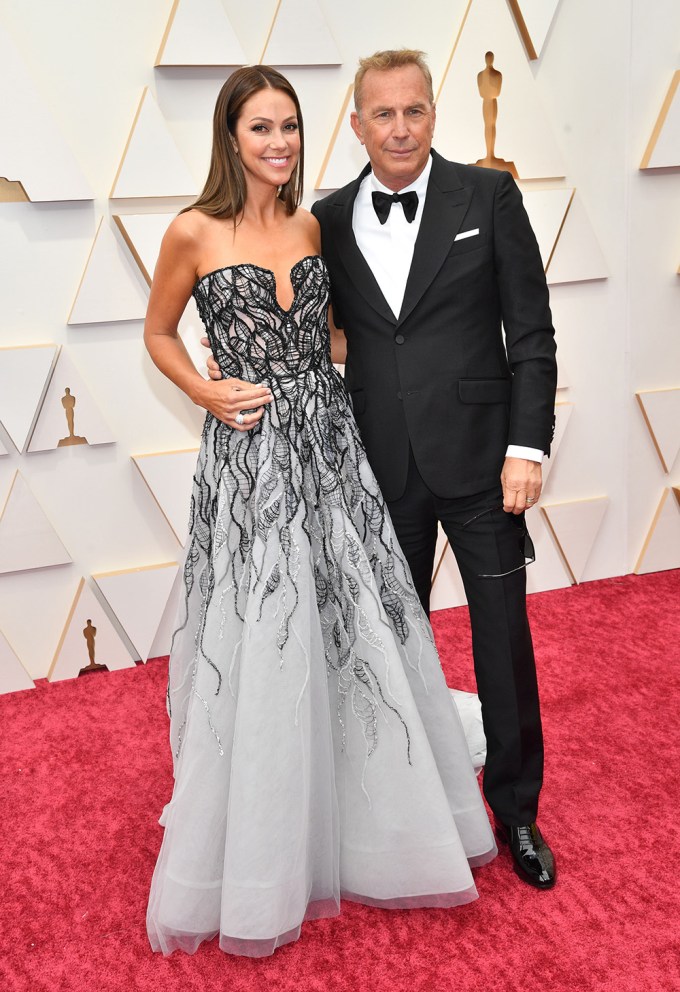 Christine Baumgartner & Kevin Costner at the 2022 Oscars