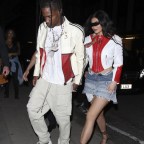 Kylie Jenner and Travis Scott are the perfect unit as they coordinate outfits outside The 22!