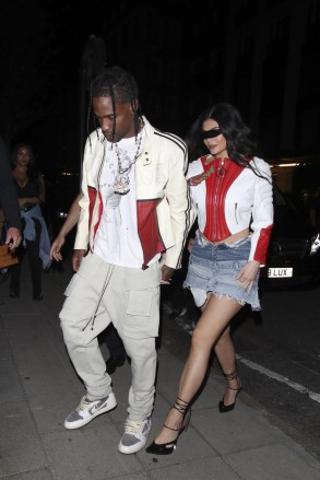 London, UNITED KINGDOM  - Kylie Jenner and Travis Scott are the perfect unit as they coordinate outfits for a night out at The 22 in London, UK.Pictured: Kylie Jenner, Travis ScottBACKGRID USA 7 AUGUST 2022 BYLINE MUST READ: Old Boy's Club / BACKGRIDUSA: +1 310 798 9111 / usasales@backgrid.comUK: +44 208 344 2007 / uksales@backgrid.com*UK Clients - Pictures Containing ChildrenPlease Pixelate Face Prior To Publication*