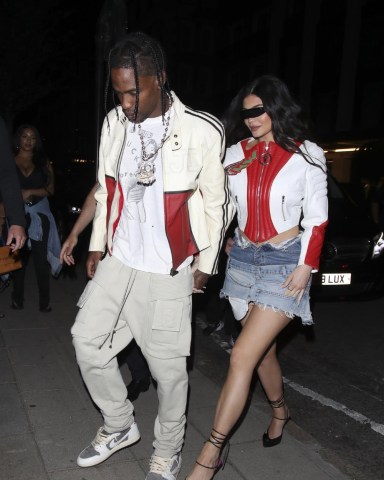 London, UNITED KINGDOM  - Kylie Jenner and Travis Scott are the perfect unit as they coordinate outfits for a night out at The 22 in London, UK.  Pictured: Kylie Jenner, Travis Scott  BACKGRID USA 7 AUGUST 2022   BYLINE MUST READ: Old Boy's Club / BACKGRID  USA: +1 310 798 9111 / usasales@backgrid.com  UK: +44 208 344 2007 / uksales@backgrid.com  *UK Clients - Pictures Containing Children Please Pixelate Face Prior To Publication*