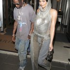 Kylie Jenner and Travis Scott hold hands leaving their hotel to party in London!