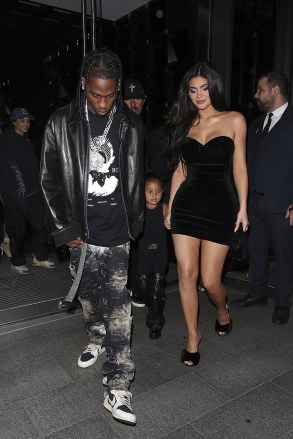 London, UNITED KINGDOM - Kylie Jenner, Travis Scott, and Stormi take over London as we catch them out for family dinner at Nobu Portman Square in London.  Pictured: Kylie Jenner, Travis Scott and Stormi BACKGRID USA 4 AUGUST 2022 BYLINE MUST READ: Old Boy's Club / BACKGRID USA: +1 310 798 9111 / usasales@backgrid.com UK: +44 208 344 2007 / uksales@backgrid.com * UK Clients - Pictures Containing Children Please Pixelate Face Prior To Publication*