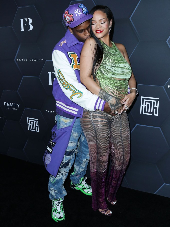 A$AP Rocky cradles Rihanna’s baby bump