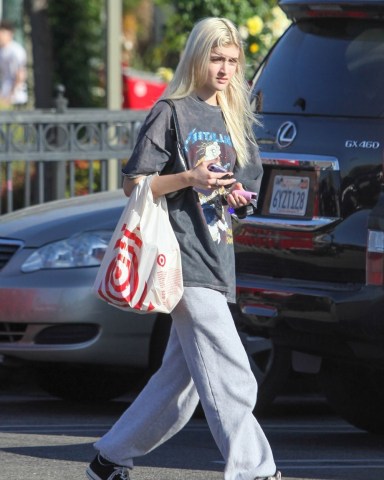 Los Angeles, CA  - *EXCLUSIVE*  - Denise Richards and Charlie Sheen's daughter Sami Sheen did her own shopping at Target with her new blonde hair in Los Angeles.  Pictured: Sami Sheen  BACKGRID USA 22 MARCH 2022   USA: +1 310 798 9111 / usasales@backgrid.com  UK: +44 208 344 2007 / uksales@backgrid.com  *UK Clients - Pictures Containing Children Please Pixelate Face Prior To Publication*
