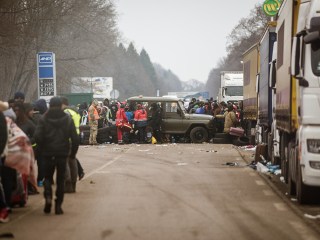 Ukraine border checkpoint. Thousands of people wait to cross the border into Poland. A line of 26 km by car from the border post. Families have been waiting for a week. People are exhausted but everything is calm. There is an incredible spirit among helping.
Ukranian Refugees on the Polish Border, Medyka, Poland - 27 Feb 2022