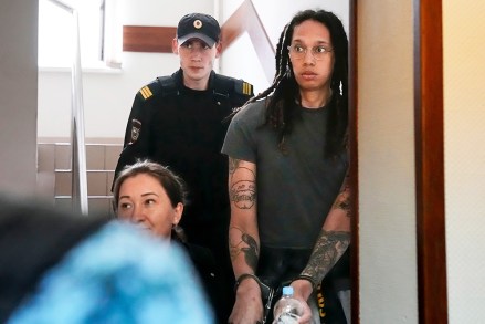 Star and two-time Olympic gold medalist Brittney Griner is escorted to a courtroom for a hearing, in Khimki just outside Moscow, Russia,.  More than four months after she was arrested at a Moscow airport for cannabis possession, American basketball star Brittney Griner is to appear in court Monday for a preliminary hearing ahead of her trial Russia Griner, Moscow, Russian Federation - 27 Jun 2022