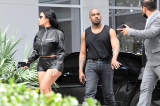 A newly single Kanye West is seen leaving his hotel with new girlfriend Chaney Jones in Miami. 03 Mar 2022 Pictured: Kanye West; Chaney Jones; Ye. Photo credit: MEGA TheMegaAgency.com +1 888 505 6342 (Mega Agency TagID: MEGA833951_010.jpg) [Photo via Mega Agency]