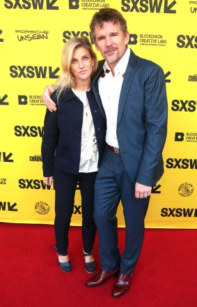 Director Ethan Hawke, right, and his wife, Ryan Hawke, arrive for the world premiere of "The Last Movie Stars," at the Paramount Theatre during the South by Southwest Film Festival, in Austin, Texas
2022 SXSW - "The Last Movie Stars", Austin, United States - 14 Mar 2022