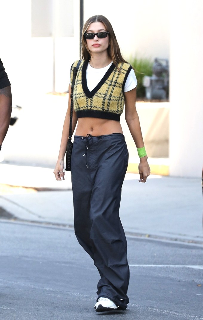 Hailey Bieber looks casual chic in a silk outfit while out running