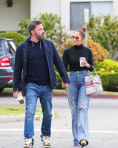 Santa Monica, CA  - *EXCLUSIVE*  - Ben Affleck and Jennifer Lopez coordinate in denim as the pair are seen enjoying their coffees while starting off their day. Jlo sported high waisted flared jeans paired witha. high neck top and wedges. The singer carried a stylish Christian Dior tote for the outing and swept her hair into a high bun.Pictured: Ben Affleck, Jennifer LopezBACKGRID USA 9 MAY 2023 USA: +1 310 798 9111 / usasales@backgrid.comUK: +44 208 344 2007 / uksales@backgrid.com*UK Clients - Pictures Containing ChildrenPlease Pixelate Face Prior To Publication*