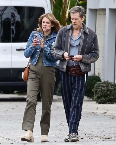 Studio City, CA  - *EXCLUSIVE*  - The "Footloose" star was sporting a pair of black crocs and striped pants as he filmed a new project alongside his daughter, Sosie Bacon. Sosie wears a denim jacket paired with olive green pants as she snacks while walking and talking next to dad.

Pictured: Kevin Bacon, Sosie Bacon

BACKGRID USA 17 DECEMBER 2022 

USA: +1 310 798 9111 / usasales@backgrid.com

UK: +44 208 344 2007 / uksales@backgrid.com

*UK Clients - Pictures Containing Children
Please Pixelate Face Prior To Publication*