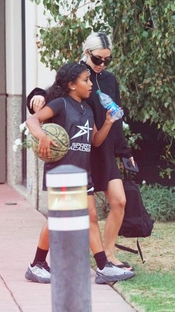 Calabasas, Calif. – Kim Kardashian was first spotted in Calabasas. Kim was seen attending a children's basketball game with her assistant Tracy. She casually wore a short black dress that showed off her discoloration. Kim suffers from psoriasis, a chronic condition that can get worse as a result of stress. Kim's Sex Her Tape Her partner Ray J said this weekend after Kim and Chris took her polygraph test on James Corden's show and denied she was involved in the tape's release. blamed her.  Ray J claims that there were two different sex tapes and that Kris chose the one that her Kim looks best on his.He also claimed Kim wrote the description for the tape in his own handwriting, in a deal with Vivid, who later released the tape.TMZ reports an email was sent to the couple. "A May 1, 2007 message from Vivid Entertainment Chief Executive Steve Hirsch tells Kim that tape revenues were $1,424,636.63, the majority of which was $1,255,578.50, mostly from DVD sales.  Jvshvisions / BACKGRID USA: +1 310 798 9111 / usasales@backgrid.com UK: +44 208 344 2007 / uksales@backgrid.com *UK clients - photos with children must have faces pixelated before publishing*