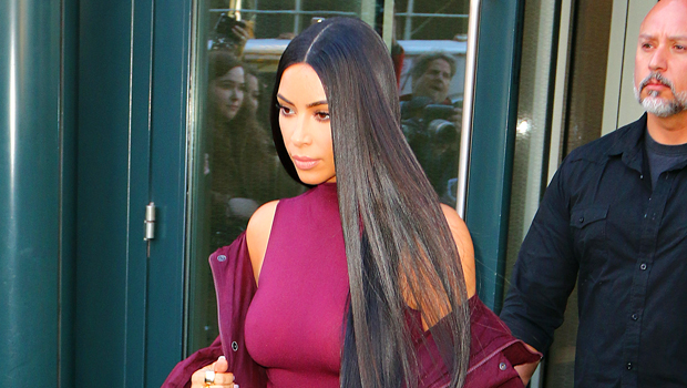 Kim Kardashian Rocks Purple Leather Dress & Matching Coat In Stunning New Photos