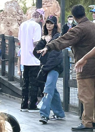 Anaheim, CA - *EXCLUSIVE* - Actress Megan Fox and the rapper Machine Gun Kelly spotted at Disneyland in California.  The couple had fun riding on the thrill-seeking Big Thunder Mountain Railroad rollercoaster.  **SHOT ON 02/04/2022** Pictured: Megan Fox - Machine Gun Kelly BACKGRID USA 4 APRIL 2022 USA: +1 310 798 9111 / usasales@backgrid.com UK: +44 208 344 2007 / uksales@backgrid.com *UK Clients - Pictures Containing Children Please Pixelate Face Prior To Publication*