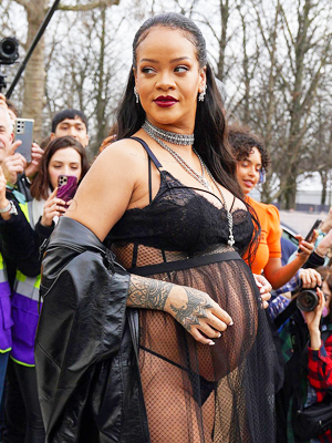 Rihanna Shows Off Baby Bump in Snakeskin Vest and Matching Bra Top