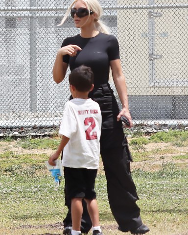 **USE CHILD PIXELATED IMAGES IF YOUR TERRITORY REQUIRES IT**Kim Kardashian at soccer with son Saint in Los AngelesPictured: Kim KardashianRef: SPL5310356 150522 NON-EXCLUSIVEPicture by: SplashNews.comSplash News and PicturesUSA: +1 310-525-5808London: +44 (0)20 8126 1009Berlin: +49 175 3764 166photodesk@splashnews.comWorld Rights, No France Rights, No Italy Rights, No Japan Rights