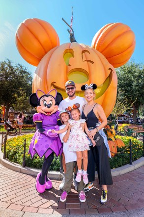 Actress Kate Hudson and her family celebrate their daughter Rani Rose's birthday with Minnie Mouse during Halloween Time at Disneyland Park in Anaheim, California, on September 26, 2022.  Holidays, pictures of Mickey Mouse pumpkins, favorite Cars Land characters dressed up in festive 