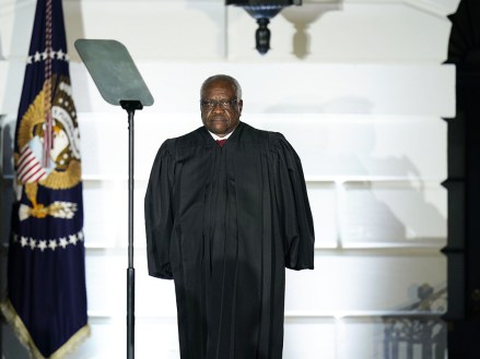Associate Justice of the Supreme Court Clarence Thomas waits to administer the oath of office to Judge Amy Coney Barrett to be Associate Justice of the Supreme Court on the South Lawn of the White House in Washington, DC.  US President Donald J. Trump and her husband Jesse M. Barrett look on.  President Donald J. Trump participates in the ceremonial swearing-in of Amy Coney Barrett, Washington, District of Columbia, USA - 26 Oct 2020