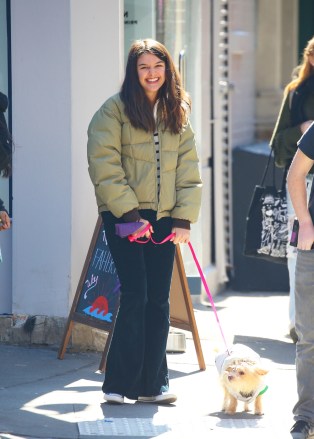 New York, NY  - *EXCLUSIVE*  - Suri Cruise and a friend pictured taking her puppy out for a stroll in NYC.

Pictured: Suri Cruise

BACKGRID USA 14 MARCH 2022 

USA: +1 310 798 9111 / usasales@backgrid.com

UK: +44 208 344 2007 / uksales@backgrid.com

*UK Clients - Pictures Containing Children
Please Pixelate Face Prior To Publication*