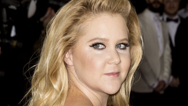 Amy Schumer Dances Topless & Shows Off Lower Back Tattoo In New Video