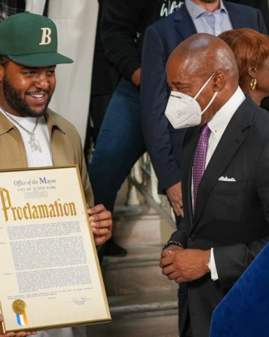 NYC mayor Eric Adams honors the Christopher "Notorious B.I.G." Wallace for his 50th birthday on May 19, 2022 at NY City Hall Rotunda in New York City, USA.   "Christopher George Latore Wallace (May 21, 1972 - March 9, 1997), better known by his stage names the Notorious B.I.G., Biggie Smalls, or simply Biggie,[3] was an American rapper and songwriter. Rooted in the New York rap scene and gangsta rap traditions, he is widely considered one of the greatest rappers of all time. Wallace became known for his distinctive laid-back lyrical delivery, offsetting the lyrics' often grim content. His music was often semi-autobiographical, telling of hardship and criminality, but also of debauchery and celebration" -Wikipedia NYC Mayor Eric Adams Honors Christopher "Notorious B.I.G." Wallace, New York, United States - 19 May 2022
