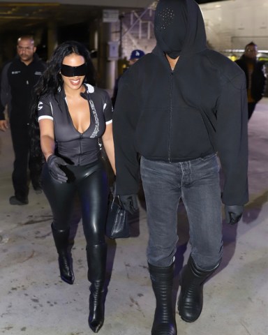 Los Angeles, CA - *EXCLUSIVE* - Kanye West signs for fans as he and his new girlfriend Chaney Jones arrive at the Lakers game at the Crypto.com Arena in Los Angeles.Pictured: Kanye West, Chaney JonesBACKGRID USA 11 MARCH 2022 BYLINE MUST READ: Flash / BACKGRIDUSA: +1 310 798 9111 / usasales@backgrid.comUK: +44 208 344 2007 / uksales@backgrid.com*UK Clients - Pictures Containing ChildrenPlease Pixelate Face Prior To Publication*