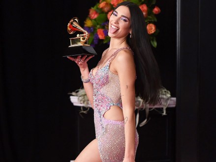 Dua Lipa, winner of the award for best pop vocal album for "Future Nostalgia," poses in the press room at the 63rd annual Grammy Awards at the Los Angeles Convention Center
63rd Annual Grammy Awards, Los Angeles, United States - 14 Mar 2021
Wearing Atelier Versace