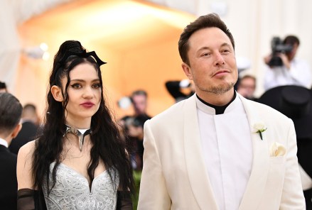 Grimes, left, and Elon Musk attend The Metropolitan Museum of Art's Costume Institute benefit gala in New York on . The Tesla and SpaceX founder tells the New York Post that he and the Canadian singer are "semi-separated." But he says they remain on good terms, she still lives at his house in California and they continue to raise their 1-year-old son together
People-Elon Musk Grimes, New York, United States - 07 May 2018