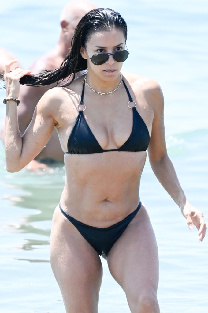 Eva Longoria shows off her incredible bikini body on the beach in Marbella