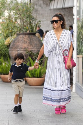 Beverly Hills, CA - *EXCLUSIVE* - Eva Longoria and her hubby Jose Baston enjoy some quality family time as they step out for lunch with their kids Santiago and Mariana at Avra in Beverly Hills.Pictured: Eva LongoriaBACKGRID USA 28 JULY 2022 USA: +1 310 798 9111 / usasales@backgrid.comUK: +44 208 344 2007 / uksales@backgrid.com*UK Clients - Pictures Containing ChildrenPlease Pixelate Face Prior To Publication*