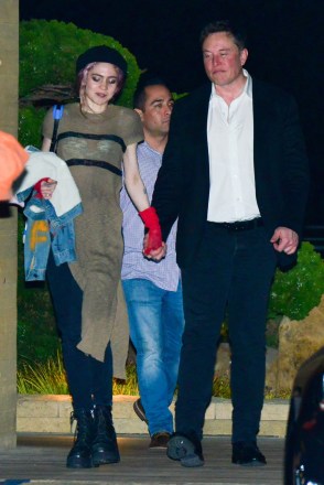 *EXCLUSIVE* Malibu, CA - Elon Musk and his girlfriend musician Grimes are enjoying a dinner date with a few friends at Nobu in Malibu.  +44 208 344 2007 / uksales@backgrid.com *UK Customers - Please pixelate faces before posting photos with children*
