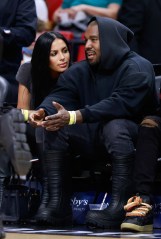 Rapper Kanye West and girlfriend Chaney Jones attend a game between the Miami Heat and the Minnesota Timberwolves at FTX Arena
Celebrities at Miami Heat v Minnesota Timberwolves, Basketball at FTX Arena, Miami, Florida, USA - 12 Mar 2022