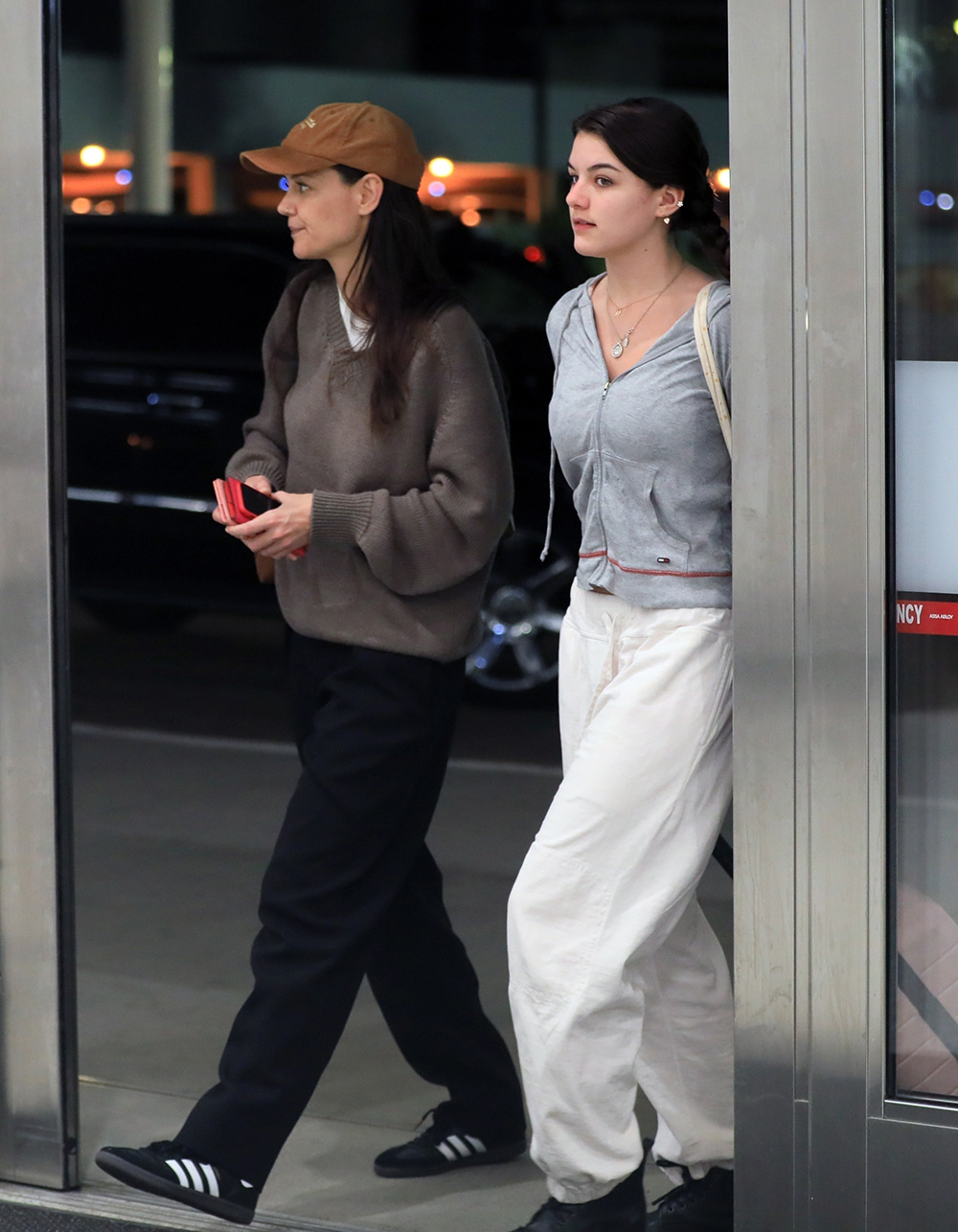 *EXCLUSIVE* Katie Holmes and daughter Suri Cruise go makeup-free and opt for casual departure out of Los Angeles