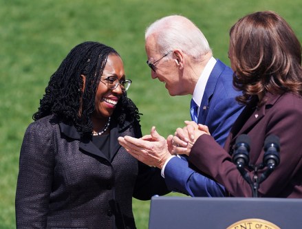 US Vice President Kamala Harris (R) speaks at an event as US President Joe Biden (C) smiles with confirmed Associate Supreme Court Justice Ketanji Brown Jackson (L) to celebrate Jackson's confirmation on the South Lawn of the White House in Washington, DC, USA, 08 April 2022. Jackson will join the Supreme Court in a few months.  Biden and Justice Jackson during Event on the South Lawn, Washington, USA - Apr 08 2022