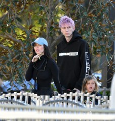 EXCLUSIVE: Machine Gun Kelly joins Megan Fox and her children for a fun day at Universal Studios Hollywood **SPECIAL INSTRUCTIONS*** Please pixelate children's faces before publication.***. 11 Mar 2022 Pictured: Machine Gun Kelly and Megan Fox. Photo credit: CelebCandidly / MEGA TheMegaAgency.com +1 888 505 6342 (Mega Agency TagID: MEGA837412_001.jpg) [Photo via Mega Agency]