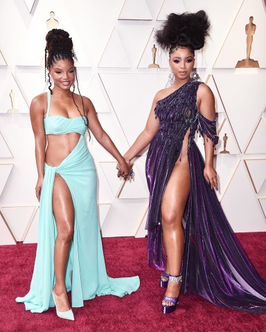 Halle Bailey, left, and Chloe Bailey arrive at the Oscars, at the Dolby Theatre in Los Angeles94th Academy Awards - Arrivals, Los Angeles, United States - 27 Mar 2022