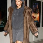 *EXCLUSIVE* Movie Date Night! Rihanna & pairs shorts and hoodie with a fur coat for a late night movie date with ASAP Rocky  in Los Angeles