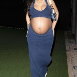 Rihanna shows off her huge baby bump while wearing denim and an LAFD hat at Nobu in West Hollywood. 06 Apr 2022 Pictured: Rihanna. Photo credit: MEGA TheMegaAgency.com +1 888 505 6342 (Mega Agency TagID: MEGA845402_001.jpg) [Photo via Mega Agency]