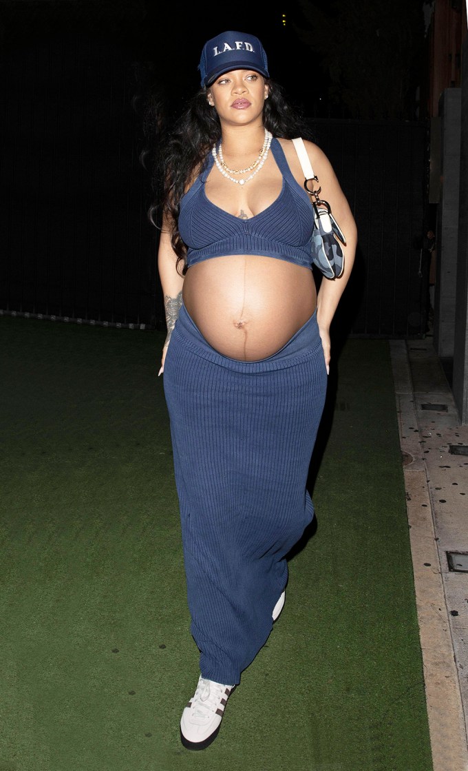 Rihanna Shows Off Baby Bump In A Crop Top & Skirt