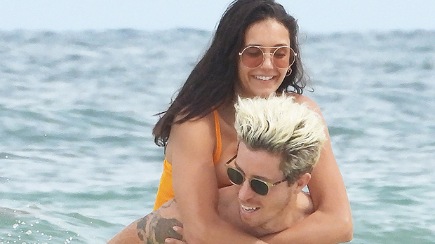 Nina Dobrev poses in a Fendi swimsuit as her boyfriend Shaun White