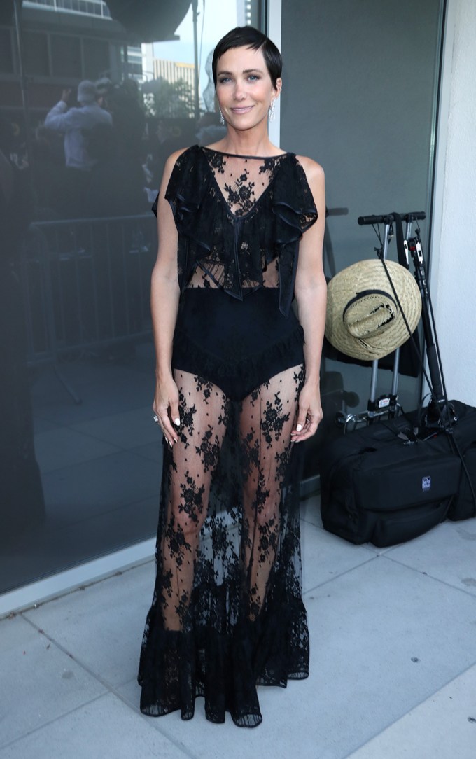 Kristen Wiig Bares Legs In Lacy Gown