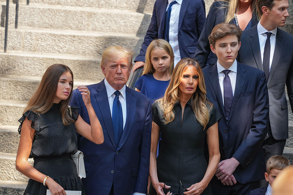 Former President Donald J. Trump, Melania Trump, and Barron Trump exit the funeral of Ivana Trump at St. Vincent Ferrer Roman Catholic Church July 20, 2022 in New York City. Ivana Trump, the first wife of former president Donald Trump, died at the age of 73 after a fall down the stairs of her Manhattan home. Funeral Held For Ivana Trump In New York City, United States - 20 Jul 2022