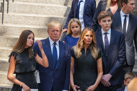 Former President Donald J. Trump, Melania Trump, and Barron Trump exit the funeral of Ivana Trump at St. Vincent Ferrer Roman Catholic Church July 20, 2022 in New York City. Ivana Trump, the first wife of former president Donald Trump,  died at the age of 73 after a fall down the stairs of her Manhattan home.
Funeral Held For Ivana Trump In New York City, United States - 20 Jul 2022
