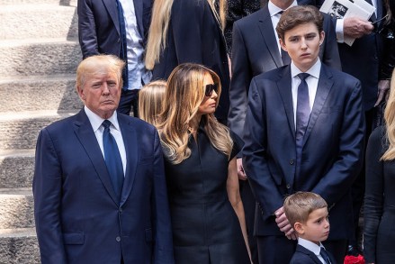 Former President Donald Trump, Melania Trump, Barron Trump watch as casket with body of Ivana Trump loaded into hearse at St. Vincent Ferrer Church. Ivana Trump, former wife of former President Donald Trump died on July 14, 2022 in her home, she was 73 years old. Funeral was attended by former President Donald Trump and his wife Melania Trump and their son Barron as well as children by Donald Trump and Ivana TRump Ivankam Eric and Donald Jr and their families including children.
NY: Funeral for Ivana Trump, Harrison, New Jersey, United States - 20 Jul 2022