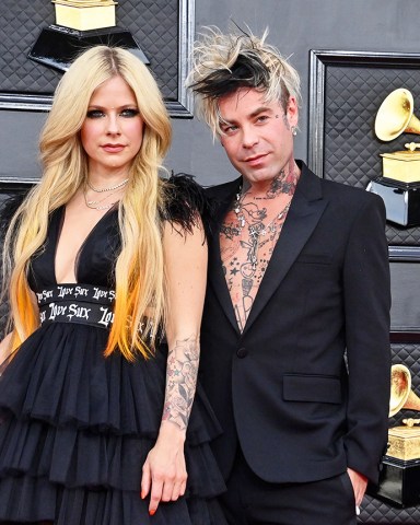 Avril Lavigne and Mod Sun arrive for the 64th annual Grammy Awards at the MGM Grand Garden Arena in Las Vegas, Nevada on Sunday, April 3, 2022. Grammy Awards 2022, Las Vegas, Nevada, United States - 04 Apr 2022