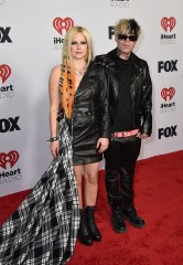 Avril Lavigne, left, and Mod Sun arrive at the iHeartRadio Music Awards, at the Shrine Auditorium in Los Angeles
2022 iHeartRadio Music Awards - Arrivals, Los Angeles, United States - 22 Mar 2022