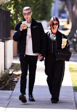 West Hollywood, CA  - *EXCLUSIVE*  - The lovebirds were dressed in black as they stepped out in West Hollywood together for refreshments at Cha Cha Matcha in Los Angeles.Pictured: Travis Barker, Kourtney Kardashian BACKGRID USA 20 FEBRUARY 2023 BYLINE MUST READ: GAMR / BACKGRIDUSA: +1 310 798 9111 / usasales@backgrid.comUK: +44 208 344 2007 / uksales@backgrid.com*UK Clients - Pictures Containing ChildrenPlease Pixelate Face Prior To Publication*