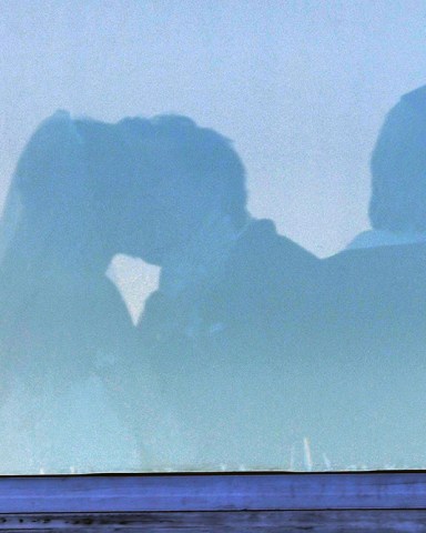Brooklyn Beckham and Nicola Peltz share their first kiss as man and wife at their wedding in Palm Beach. 09 Apr 2022 Pictured: kiss. Photo credit: Backgrid/MEGA TheMegaAgency.com +1 888 505 6342 (Mega Agency TagID: MEGA846278_007.jpg) [Photo via Mega Agency]