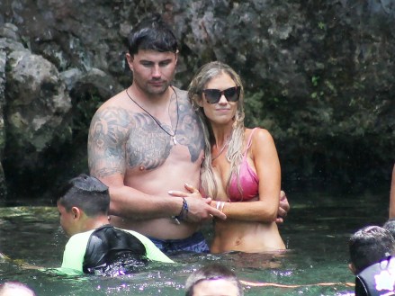 Flip or Flop star Christina Haack looks stunning in a pink bikini as she visits a natural swimming hole in Mexico with new boyfriend Joshua Hall. The TV star - who has officially finalized her divorce from ex-husband Ant Anstead - visited the natural beauty spot in Tulum where she is celebrating her 38th birthday. The photographs emerged after she and the fellow real estate agent became Instagram official when she shared an image of a romantic dinner together. According to reports her ex-husband husband Ant is now dating Bridget Jones star Renee Zellweger. 08 Jul 2021 Pictured: Christina Haack. Photo credit: MEGA TheMegaAgency.com +1 888 505 6342 (Mega Agency TagID: MEGA768874_064.jpg) [Photo via Mega Agency]