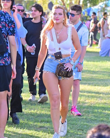 EXCLUSIVE: Bella Thorne out at Coachella. 15 Apr 2022 Pictured: Bella Thorne. Photo credit: Snorlax / MEGA TheMegaAgency.com +1 888 505 6342 (Mega Agency TagID: MEGA848645_009.jpg) [Photo via Mega Agency]